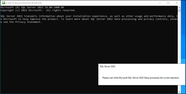 A DOS window and a message indicating that SQL Server is being installed.