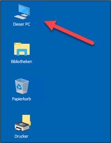 Screenshot of the default desktop with an arrow pointing to "This PC".