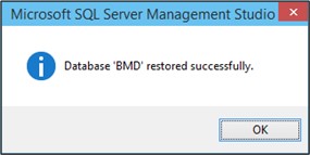 Screenshot of a message stating "Database 'BMD' restored successfully."