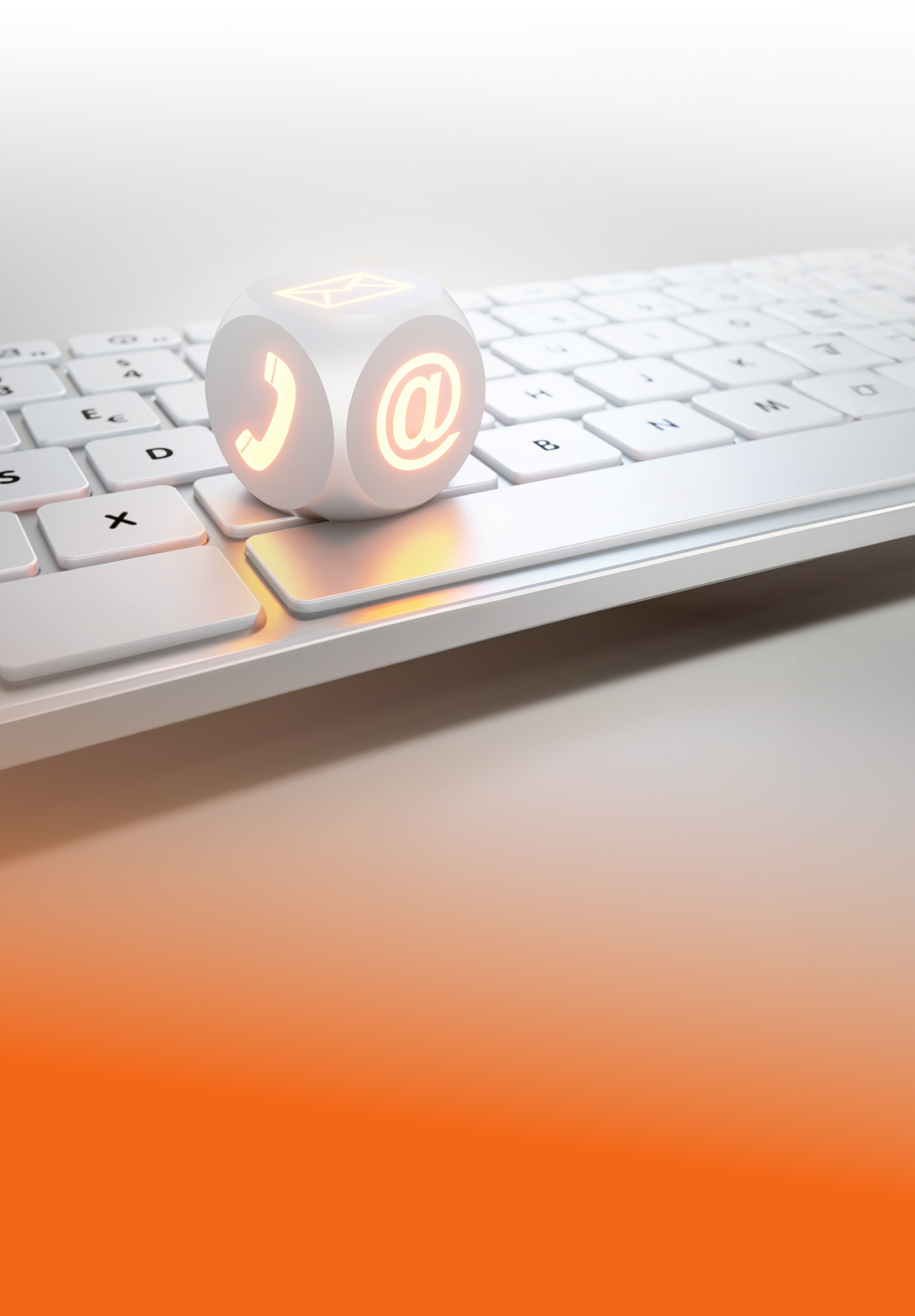 White computer keyboard with a white cube on top. Instead of the eyes, it shows a telephone icon, an @ sign and a letter icon.